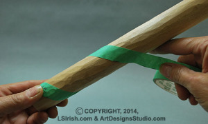 carving a  walking stick snake