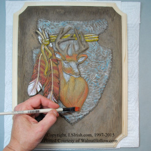 how to paint a wood carving