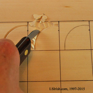 Freeing a rough cut chip from a stop cut.