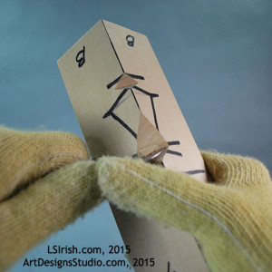 creating the slope of the nose of a wood spirit wood carving