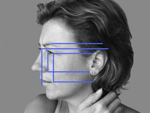 how the facial features of a wood spirit carving align