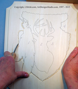 Making a stop cut in relief wood carving