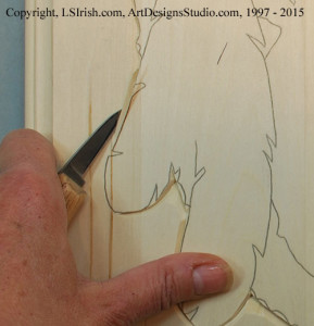 Two stroke stop cut in relief wood carving