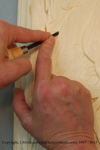 Using a v-gouge in relief wood carving