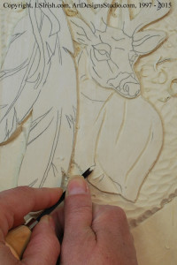 Shaping the Mule Deer body in wood carving