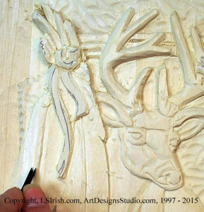 Shaping feathers in wood carving