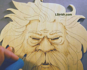 wood burning the wood spirit face