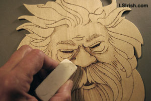 wood burning the wood spirit face