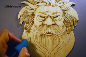 wood burning the wood spirit face