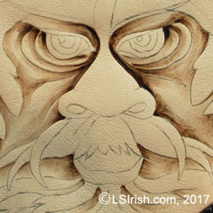 Pyrography burning the greenman face
