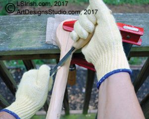 using a draw knife in wood carving