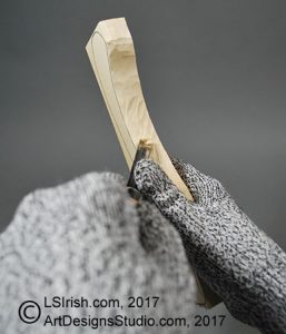 chip knife cutting a wooden spoon carving blank